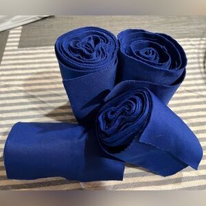 Royal blue horse standing wraps